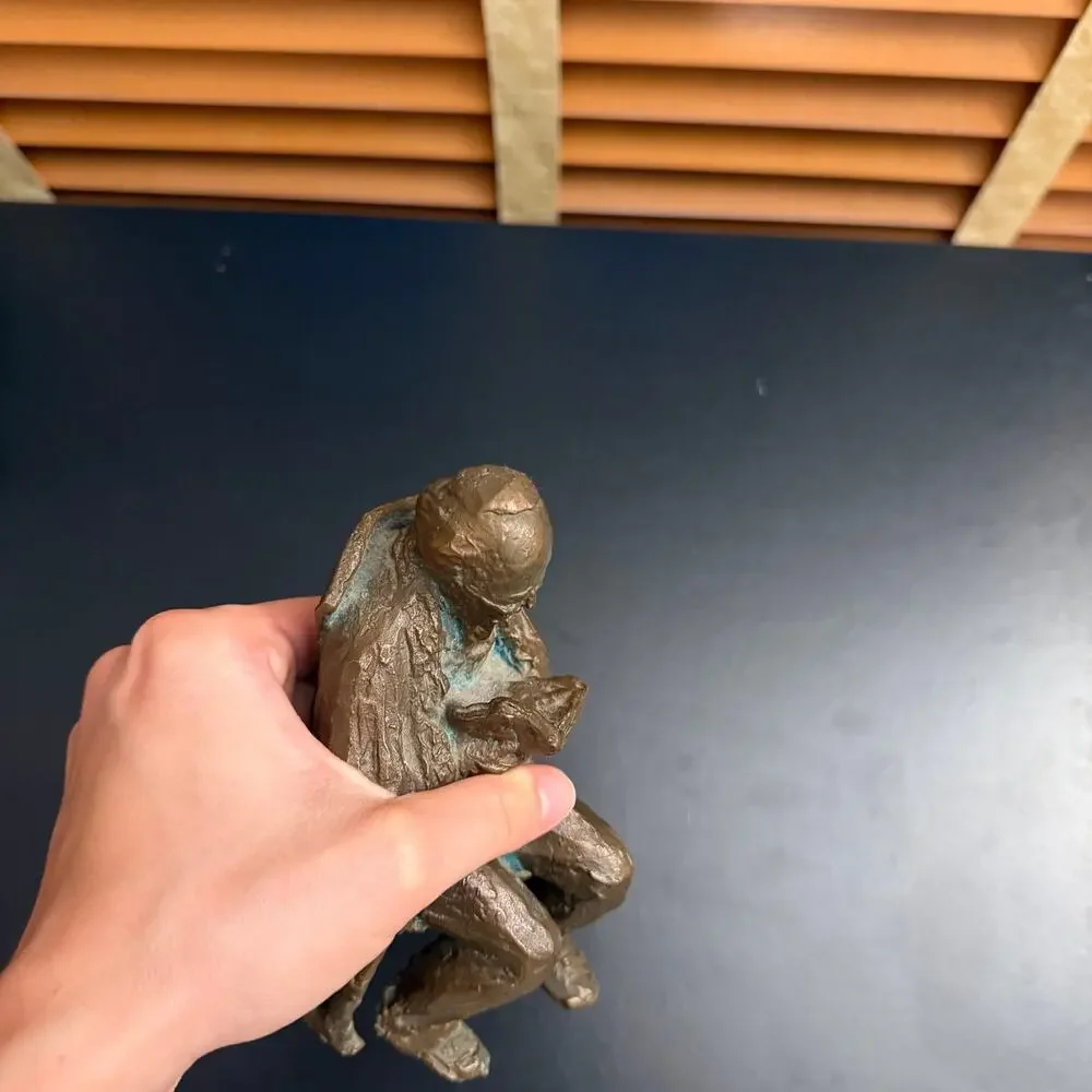 Vintage Heavy Brass Man Reading in Rocking Chair Sculpture